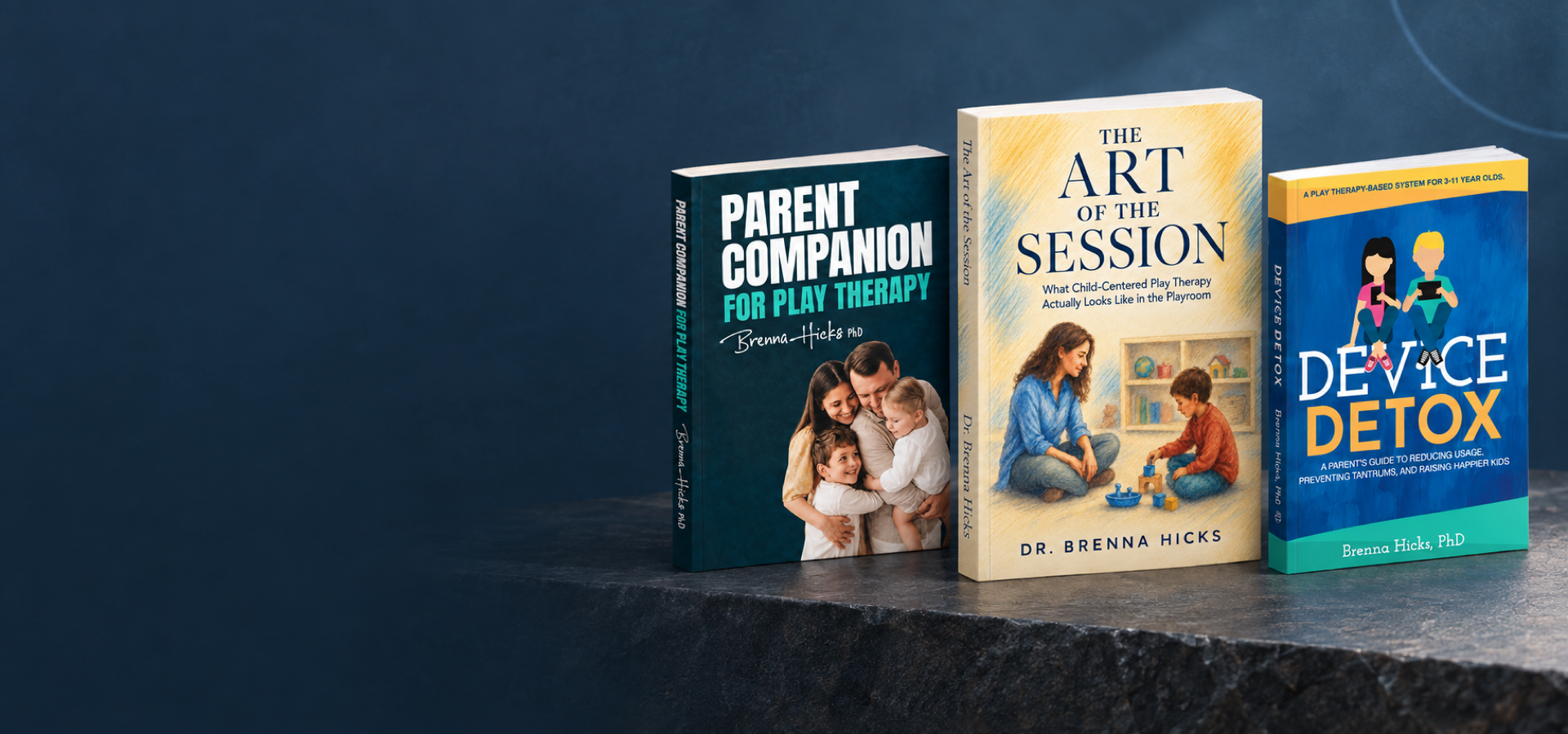 The Art of the Session, Parent Companion for Play Therapy, and Device Detox displayed together on a slate ledge